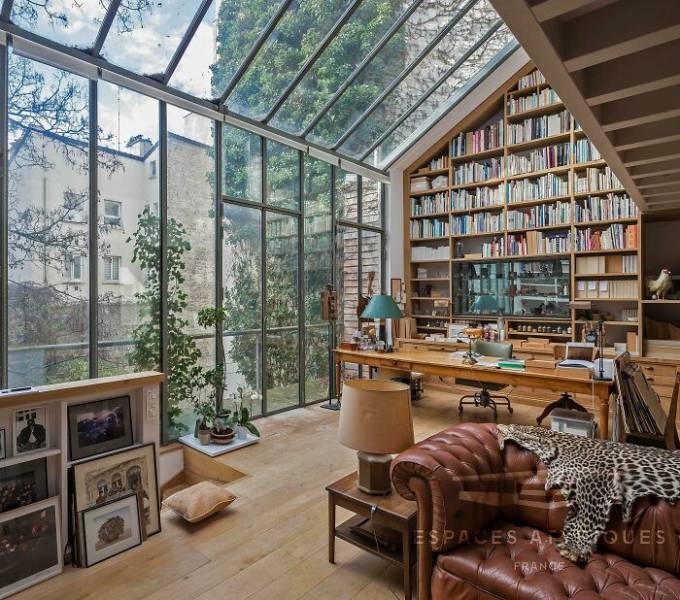 "The Architecture Of This Home Office/Library Located In The 13th Arrondissement Of Paris"