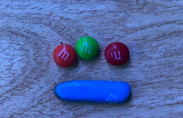 An unusually long m&m.