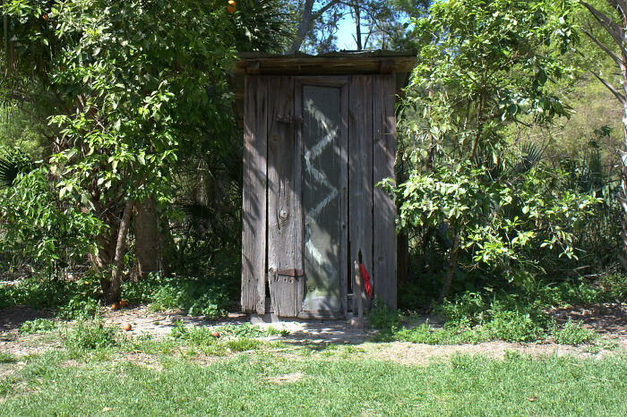 My great-grandfather was one of the last people in town to get indoor plumbing, so he had an outhouse in his yard. Every Halloween, the neighborhood kids came into the yard and knocked over the building to expose the cesspit. He got tired of it, so one year on the night before Halloween, he moved the building forward and covered the fess with burlap, disguising it in leaves and grass clippings. In the dark, it was almost impossible to tell it was there. On Halloween night, he sat in the outhouse and waited. It wasn’t long after sundown when he heard the wet splat outside as a couple of kids fell into the muck. He lowered a ladder into the cesspit for them to leave after making them promise to never mess with his outhouse again. The kids honored their promise and even spread the word around the neighborhood not to mess with that outhouse any more.