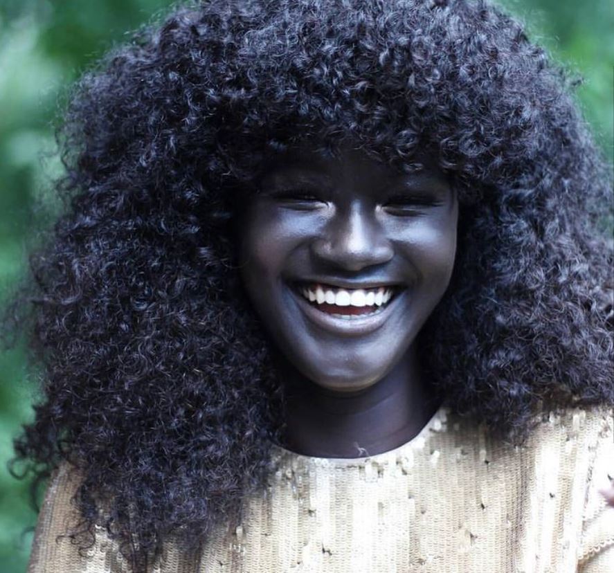 Given the nickname “melanin goddess,” Khoudia Diop is a model with a very dark skin tone.