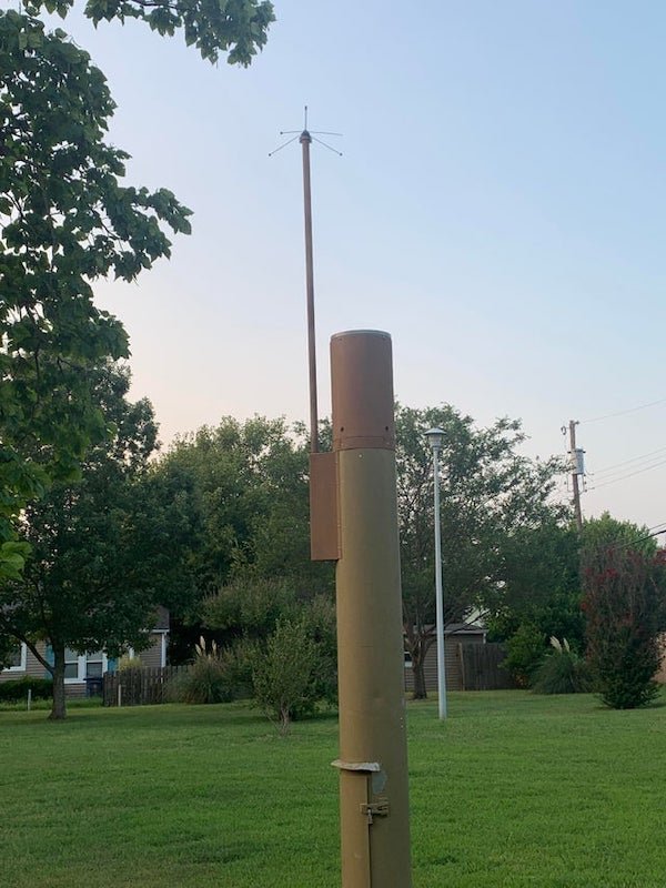 Found in a park near my house, in Tulsa. Old weather gauge/equipment?

A: I used to work on these, its a weather gauge station. The top part has a tipping bucket under a funnel and it transmits through radio every time it tips. Sometimes they have a pressure transducer running to a stream or river to calculate how much it has risen in a set amount of time.