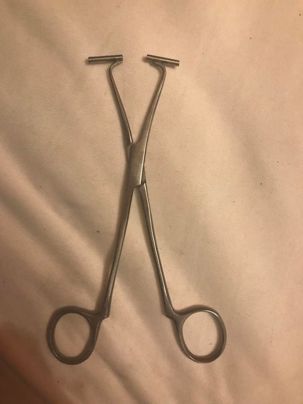 What is this? Scissors or clamp with a small tube at the end of both sides

A: Want to say piercing clamps maybe