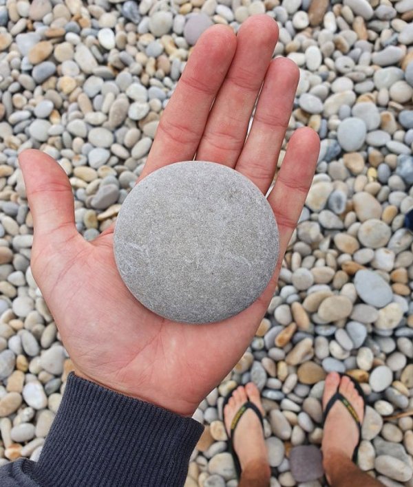 This rock I found on Chesil Beach, UK, is perfectly round.