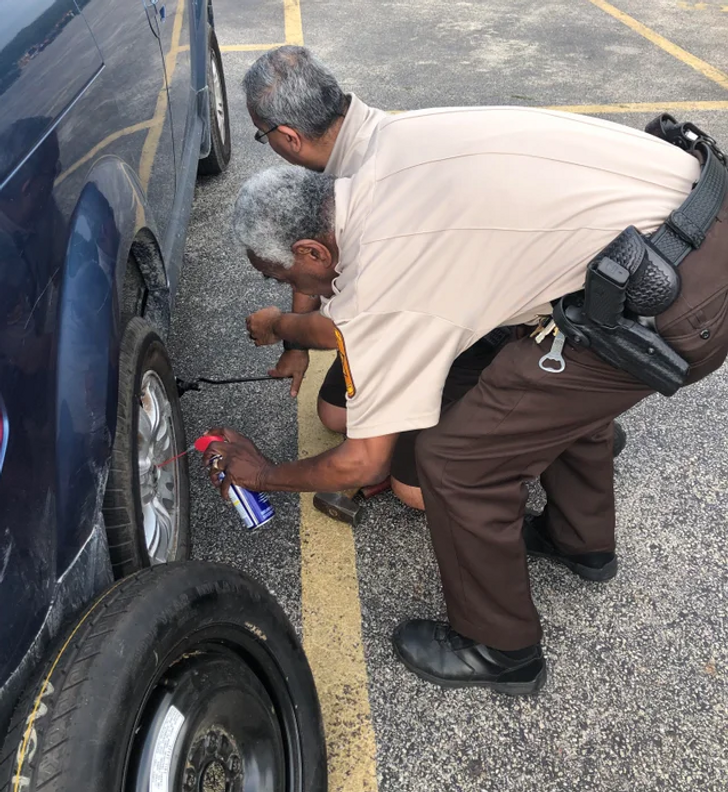 “2-headed police officer helping change my tire”
