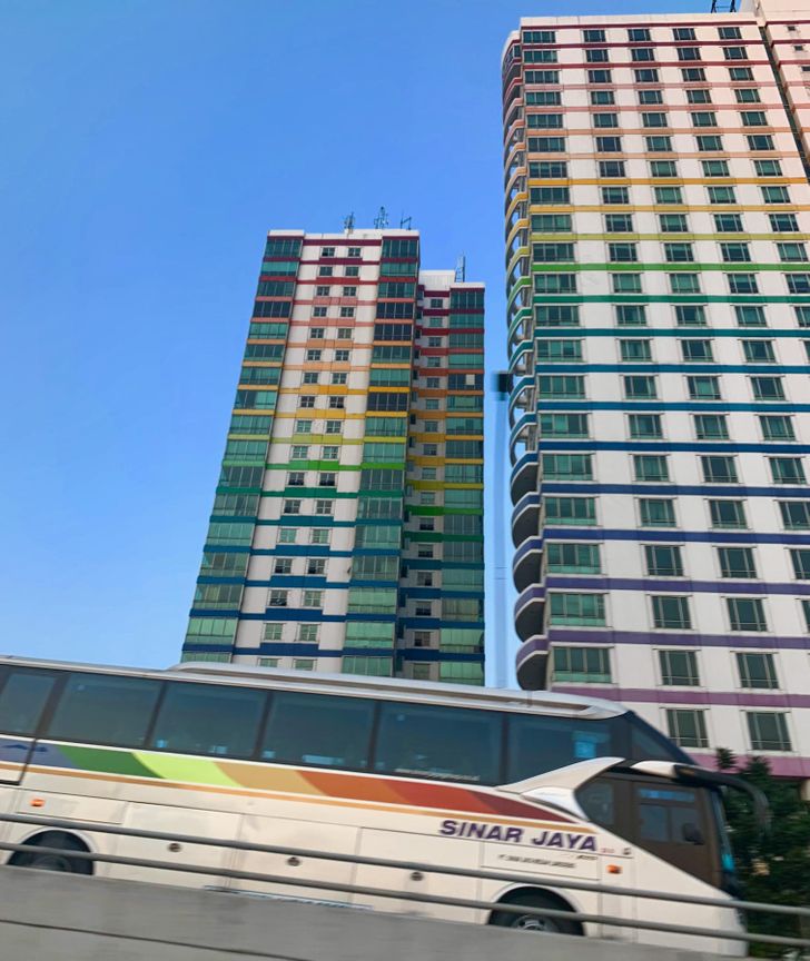 “Took a picture of some rainbow buildings while in a taxi, didn’t notice the perfectly timed rainbow bus driving next to us until after!”