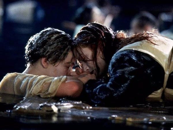 Plot Hole: Why didn’t Jack and Rose just share the big door in Titanic (1997) when they could’ve both fit?

Explanation: Jack and Rose could not have both gotten onto the door. They even showed Jack trying to climb up and the whole thing capsizing.