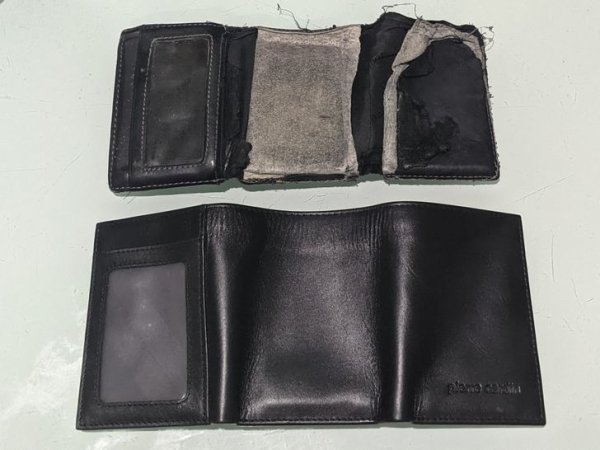 Approximately 10-year-old wallet vs New wallet.