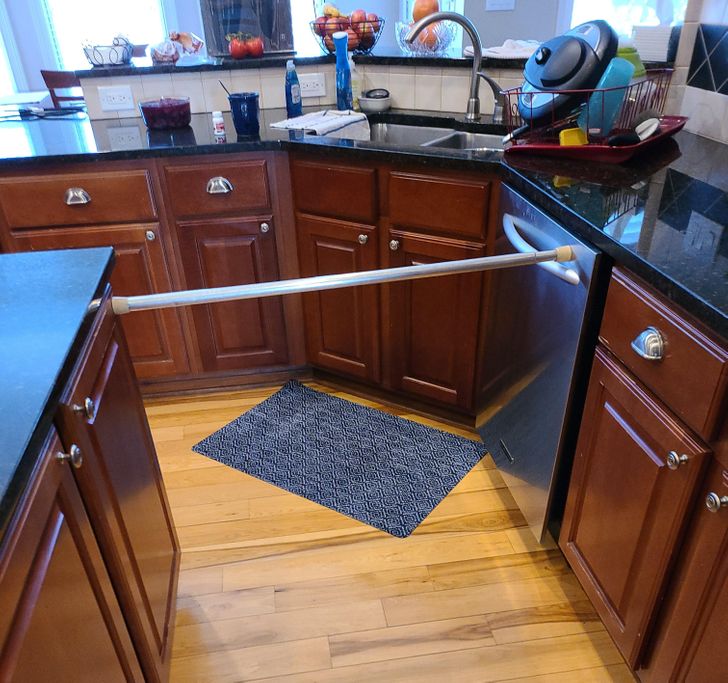 “My dad’s solution to keeping the dishwasher door from opening mid-cycle”