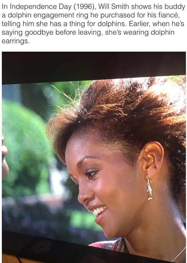 90s movie facts - hairstyle - In Independence Day 1996, Will Smith shows his buddy a dolphin engagement ring he purchased for his fianc, telling him she has a thing for dolphins. Earlier, when he's saying goodbye before leaving, she's wearing dolphin earr