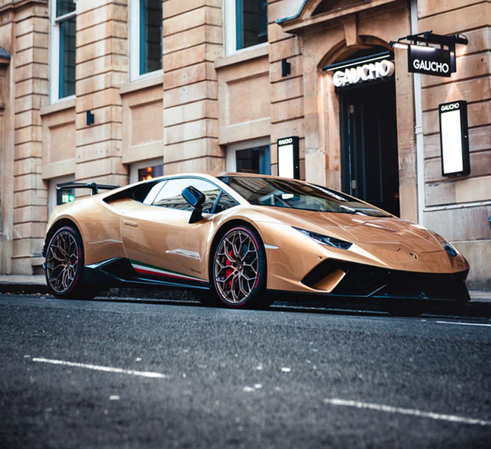 Spoiled rich kid showed up to school in a $325,000 sports car. He was showing off, lost control of the car, and drove it through a brick wall and totalled it.