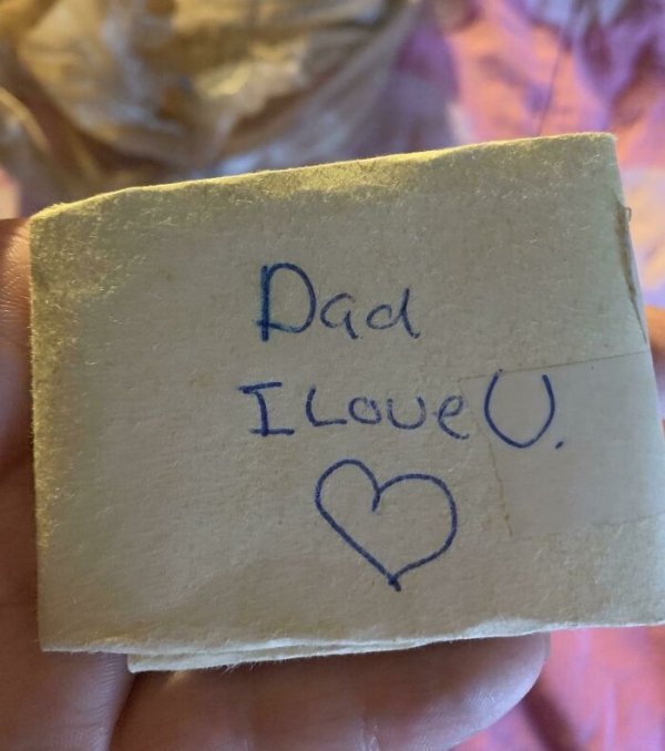 My dad passed unexpectedly a few weeks ago and my mom found this in his drawer. It’s a piece of cardboard wrapped in construction paper that I gave him as a kid. He had kept it at least 15 years.