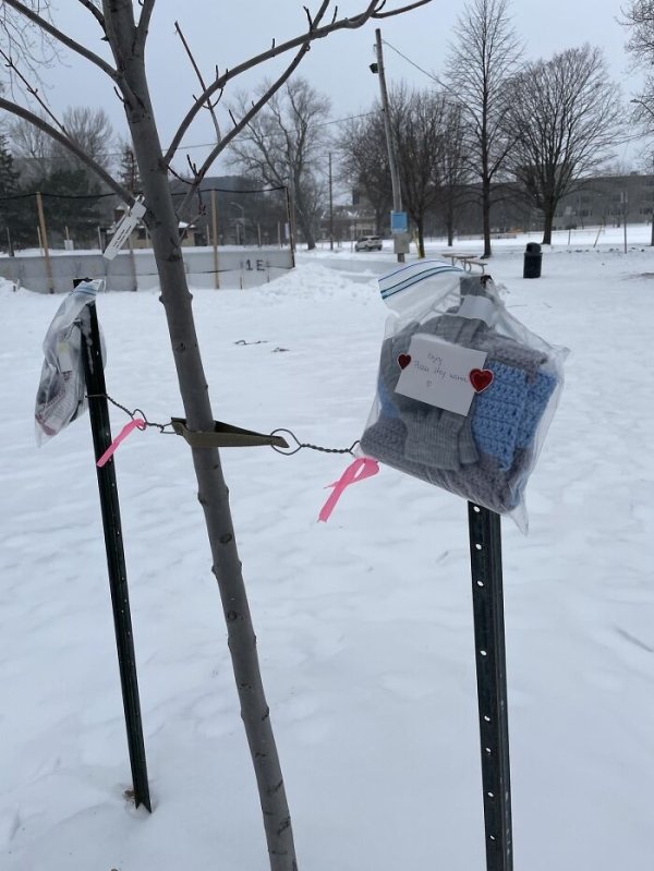 People have been leaving these packages of socks, hats, scarfs, gloves etc around my city.