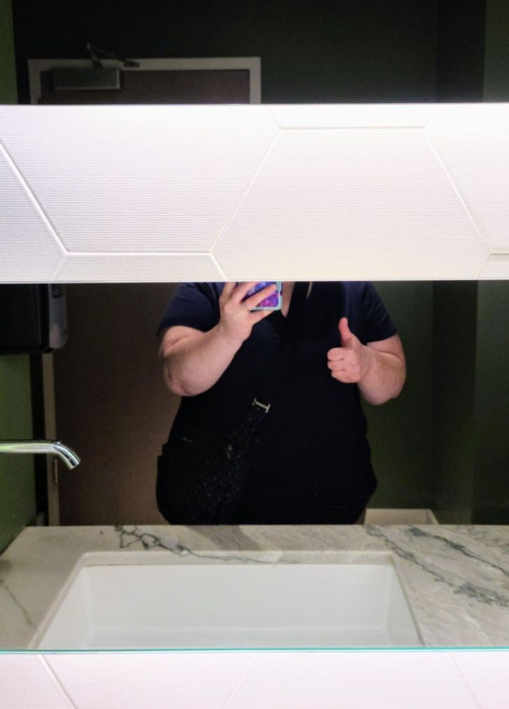 “Restaurant bathroom: one mirror panel on top, one on the bottom...no way to see myself in between.”