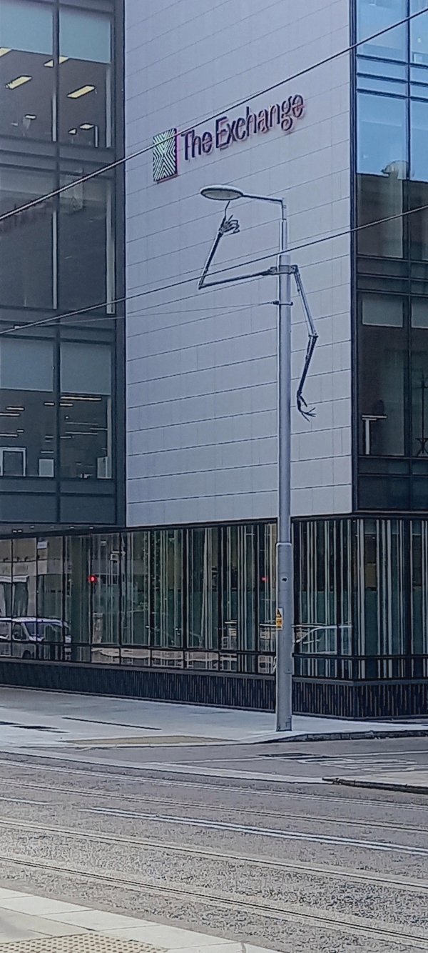This street lamp has arms!