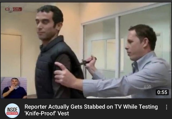 photo caption - Inside Reporter Actually Gets Stabbed on Tv While Testing 'KnifeProof Vest Edition