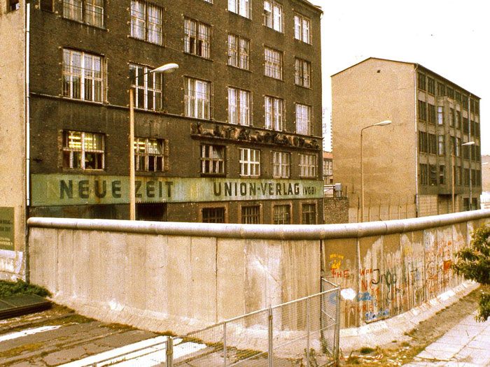 A German bureaucrat messing up on live TV led to the Berlin Wall falling.

This East German guy, Gunter Schabowski, was set to announce new travel being allowed outside of East Germany- in a few days from the announcement, and one had to wait days to get and have the special travel visa authorized. He was to announce on live government TV.

He was rushed and tired, going to the press conference, and had not read the official government press release before coming on live TV. An aide just handed him the paper, which he read on camera.

But, like I said, he was unprepared, tired, and rushed. So he read the first part of the release, which said "the government now authorizes travel freedom" on live TV. A reporter then asked "so when does this take effect?" He had not had the chance to read about the travel limits and visa requirements yet, and had had a long day. So instead of taking several live minutes to read the whole thing, Schabowski just mumbled "as far as I know...right away."

This led to thousands of East Germans massing at the Wall and border checkpoints. People got angrier and angrier as they were refused passage. Finally, to avoid a riot or getting hurt themselves, one guard let some people on through. This led to a chain reaction...and so bye-bye, Berlin Wall.

TL;DR: Tired, unprepared East German bureaucrat misreads press release relating to travel permissions on live TV, leads to Berlin Wall falling.