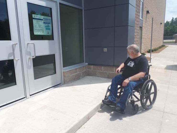 "The new school in my community has a wheel chair access button for the door, but no way for a person in a wheel chair to reach it"