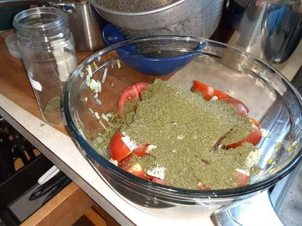 Making a salad for dinner. Grabbed the oregano instead of the parsley. The parsley has a sprinkle cover…the oregano does not.