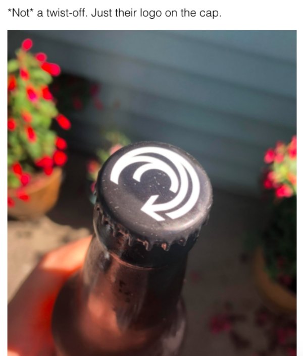 glass bottle - Not a twistoff. Just their logo on the cap.