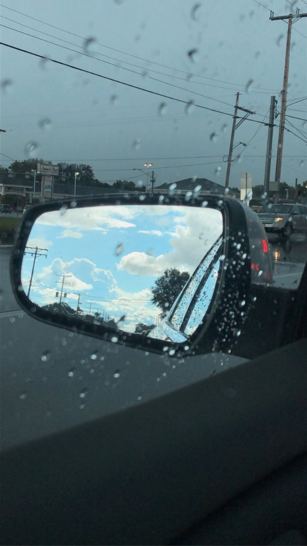 “Driving into a storm with the sunshine in my mirror.”