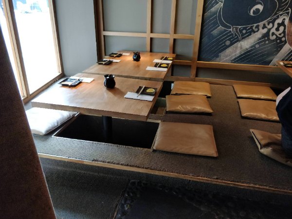 “This sushi restaurant has tables that simulate traditional Japanese seating while letting you sit normally.”