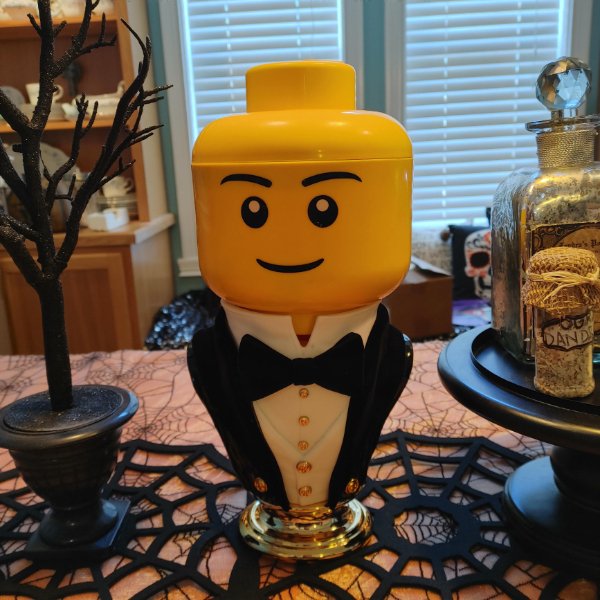 “This lego head fits perfect on this bath and body works candle holder.”