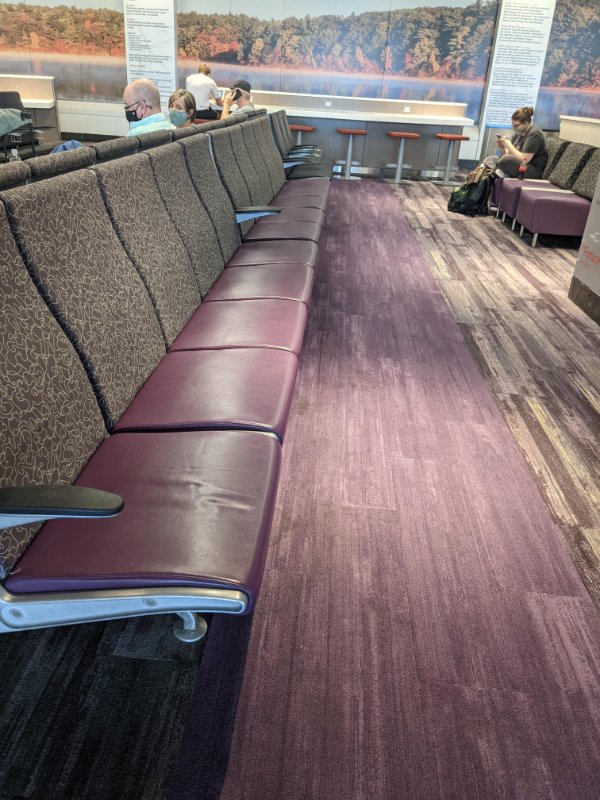 “These seats at Logan airport that don’t prevent you from laying down.”