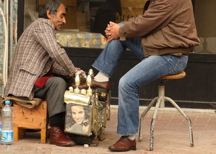 Istanbul, Turkey:
Shoe cleaners: a lot of times an older man will be walking in front of you and "accidentally" drop a brush. If you pick it up, he'll offer you to clean your shoes. You're going to think that's free, but nothing is free.