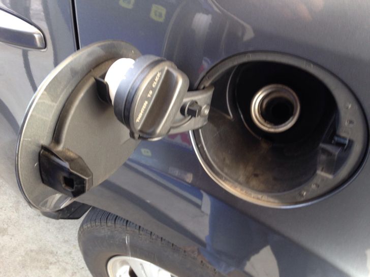 gas cap holder in car - 1