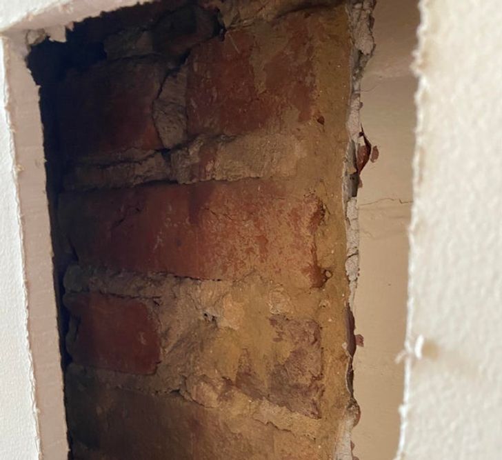 “Only took a few days after closing on our 1879 row home for us to find a brick fireplace hidden behind drywall!”