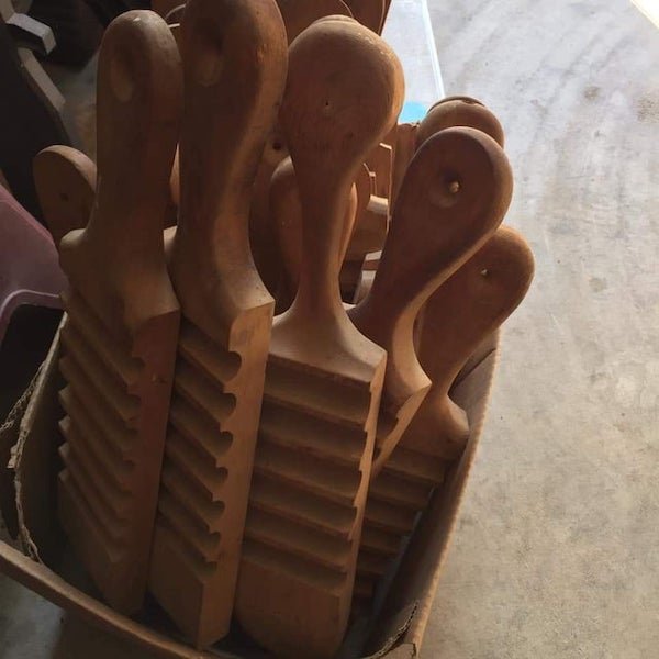 Grooved wooden paddles. Was thinking maybe to clean something? Estate sale had 23 so assuming it’s disposable.

A: It’s a mold for cigars.