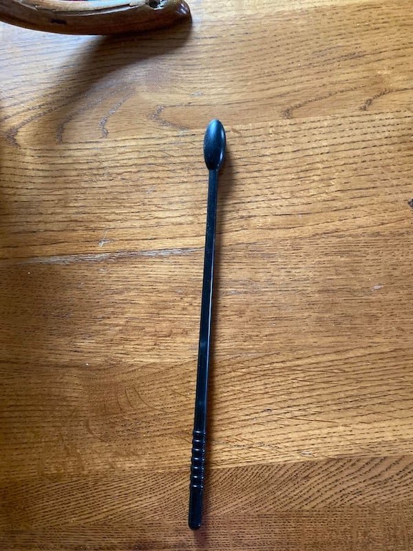 Would be grateful for any help identifying this. It was found in a dryer and I have no additional information at this time. It seems to be metal and I’m unsure of the length as well.

A: That’s a toy drumsick for a little kids drum set.