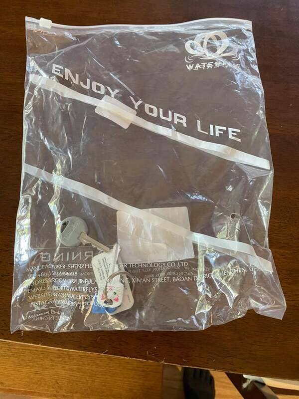 After a 20+ year relationship and a rough breakup, my ex-partner dropped off her keys to the house today in this bag.