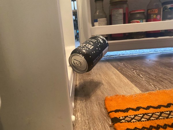 “A beer can fell out of our fridge and landed like this.”