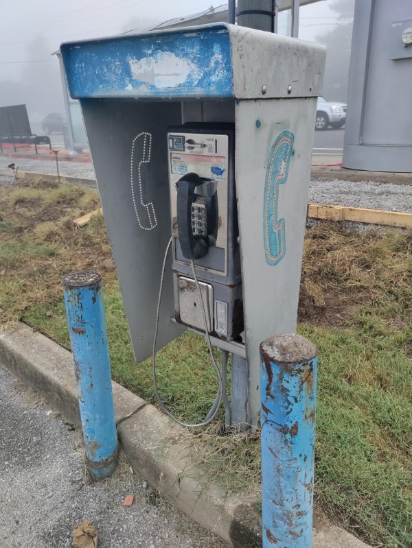 “Saw a payphone with the telephone still attached.”