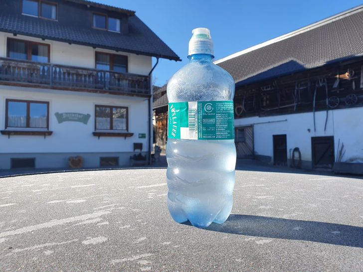 “My friend took this picture of a frozen water bottle on top of his car but it seems giant.”