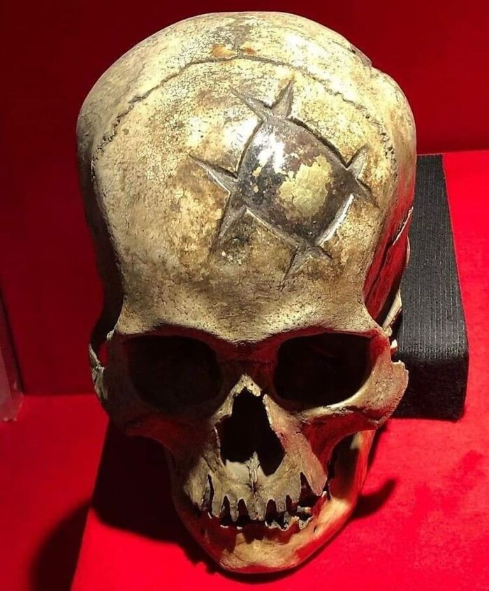 inca skull with gold plate