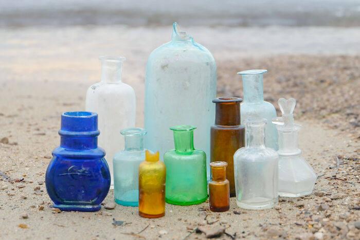 beach finds - washed ashore - old bottles on beach