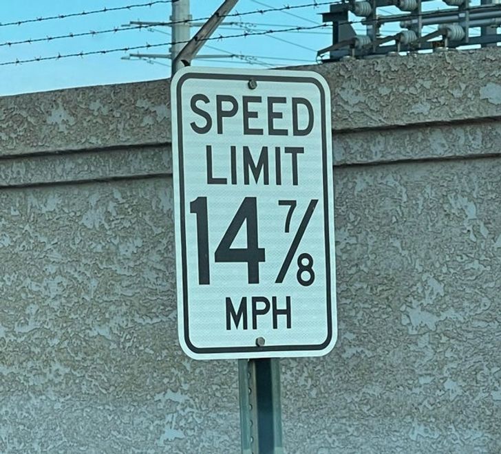 street sign - Speed Limit 14% Mph