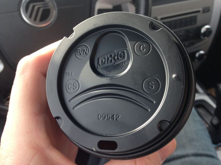 This coffee cup lid has a space for your nose.