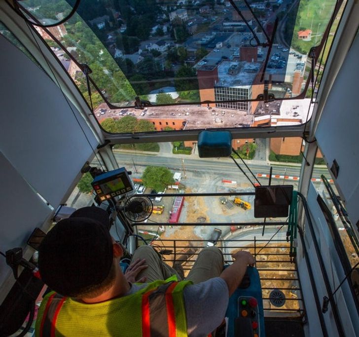 “Inside the operator cab of a 240-ft tower crane”