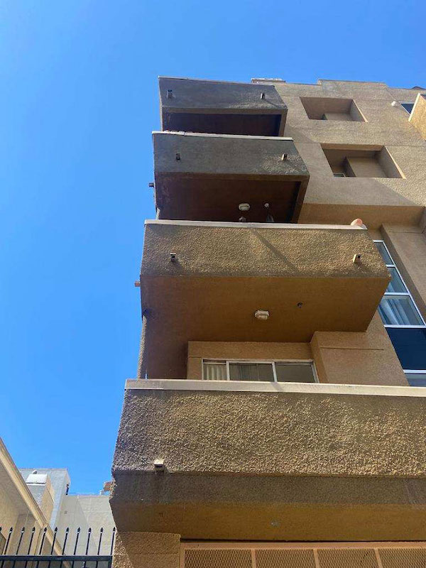 These balconies have seen better days. As you can see, the wood framing of these balconies is experiencing some deflection. This is why The Balcony Bill exists. The Balcony Bill, formerly known as California Senate Bill 721, was signed into law back in 2018. This bill requires the inspection and possible repairs on all balconies, decks, and stairs that rely in whole or in substantial part on wood structural support in multi-family residential buildings with three or more dwelling units.