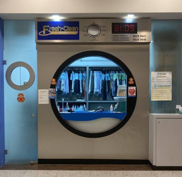 “A dry cleaning stall in Singapore that looks like a giant washing machine”