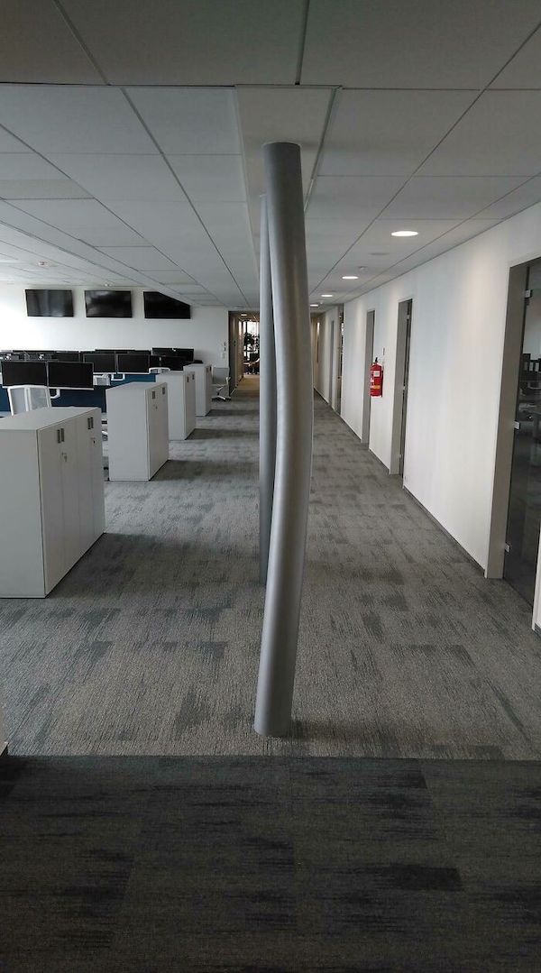 This pillar was straight last week. This is the first floor of a seven-floor building.