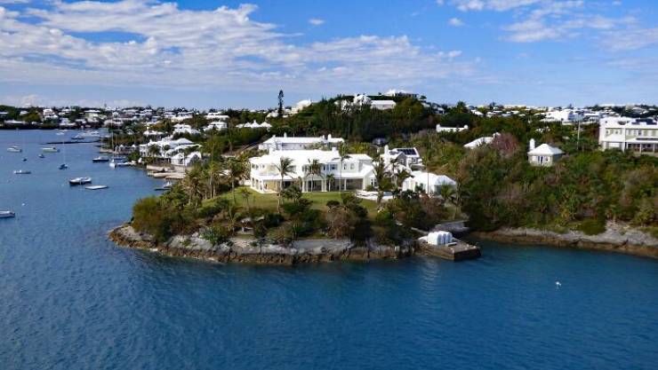 "I googled why every single house in Bermuda has a white roof. Here's what I found. Despite being a tropical paradise, Bermuda actually has no real access to fresh water, which normally would come from sources such as rivers and lakes, but the people of Bermuda have come up with an ingenious solution. Turns out the roofs are designed in this odd way to harvest their only source of drinking water: the rain. So those steps slow down the heavy rainfall helping the gutters to collect as much water as possible and the white paint reflects ultraviolet light from the sun which purifies the water. It is then stored in a tank under the house and thanks to this every home in Bermuda is self sufficient. There are no water mains or water rates."