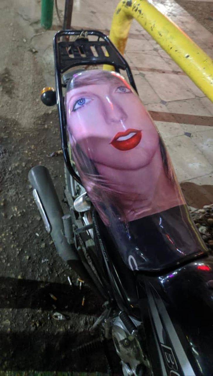 "Taylor Swift’s face on a motorbike seat"