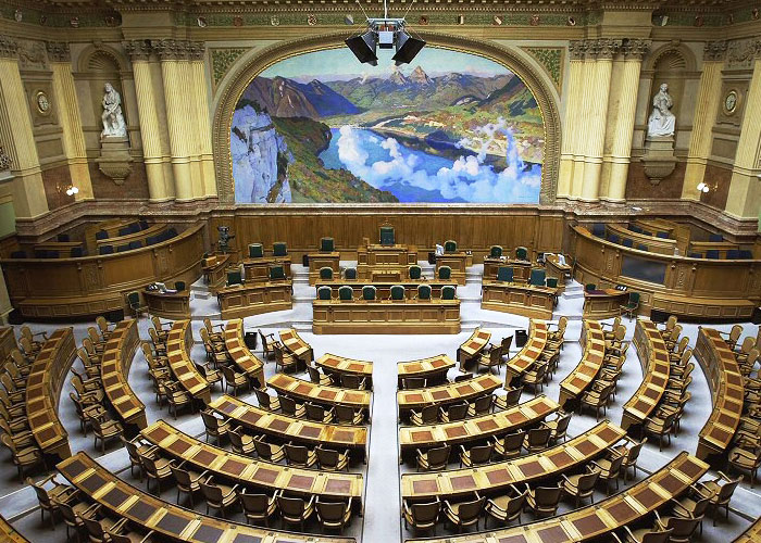 Switzerland has 7 simultaneous "presidents", each with equal power. Every year they rotate control of 7 federal depts & who acts as "head of state" (e.g. when dealing with other countries). They come from various parties — right now it's 2 conservatives, 2 liberals, 2 socialists, and a centrist