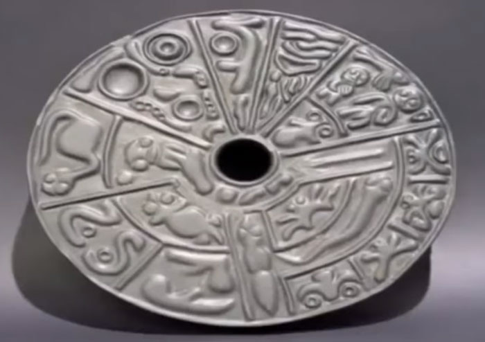 "This is called the Genetic Disc, and it's estimated to be around 6000 years old, founded in South America. This disk is to be known to rewrite history. So the symbols are written in lydite and they actually have to use a microscope to look at all the hieroglyphics on it. But the strange thing about it is, it has no ancient culture that it belongs to or not that we know of. We have not found the tribal culture that it belongs to."