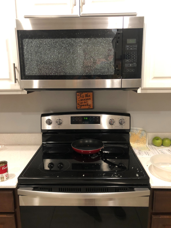 people having a terrible day -  microwave door exploded