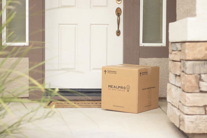 packaging box on doorstep - Mealpro